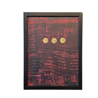 painting of two gold coins on a red background in a black frame