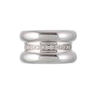 an image of a close up of two rings with diamonds on them
