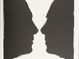 a book with a drawing of two people facing each other