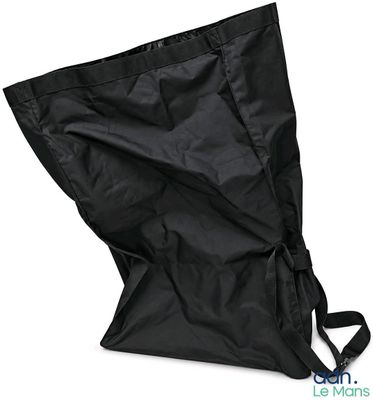 the large black bag is sitting on top of a white surface
