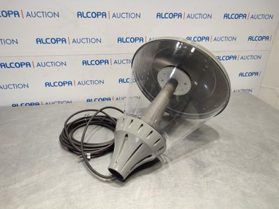 a close up of a blow dryer on a table with a cord