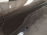 a close up of a car ' s door handle and door handle