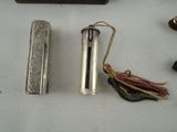 two lighters that are sitting on a table