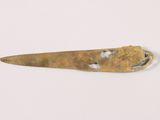 an image of a knife that is on a white surface