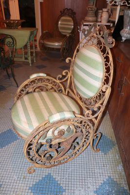 a chair that is sitting in the middle of a room