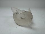 a glass object that looks like a cat ' s head