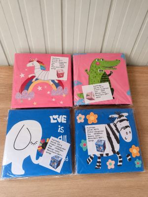 four children ' s books with pictures of animals and animals on them