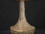 an image of a lamp with a wicker shade on top of it