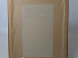 an old picture frame with a piece of paper attached to it