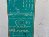 a blue sign on the side of a building that says atl