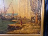 une photo d'un tableau accroché au mur au bord de l'eau