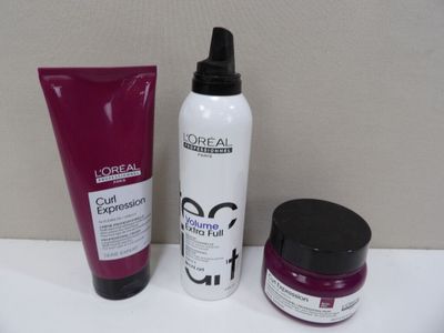 two different types of hair products sitting on a counter