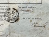 an old document with a stamp on it that has a picture of a man on it