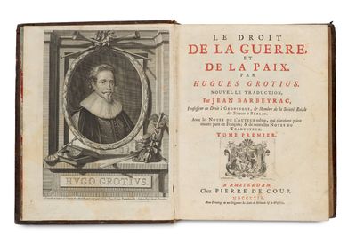 an old book with a picture of a woman in a frame