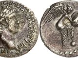 une pièce d'argent représentant une femme et un oiseau