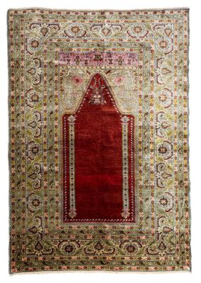 un tapis orné d'un motif rouge et vert