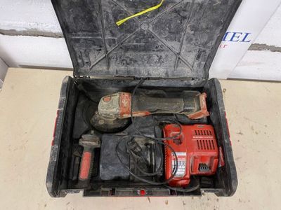 a tool box with a hammer and a drill inside of it