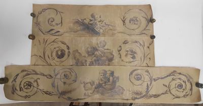 une feuille de papier sur laquelle figurent des dessins, posée sur une table