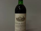 a bottle of wine that is sitting on a table