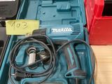 a blue tool box with a corded drill and other tools in it