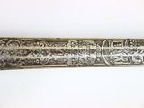 an old baseball bat with a design on it