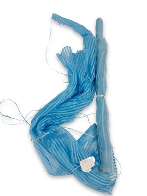 a picture of a blue object that is on a white surface