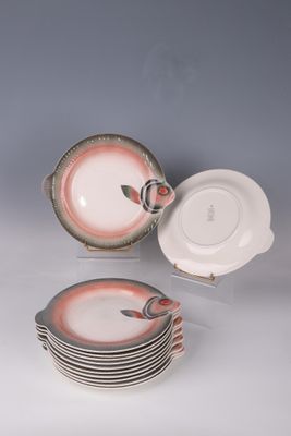 several plates and bowls are stacked on top of each other