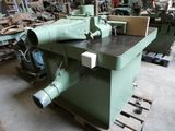 a machine that is sitting on a pallet in a warehouse