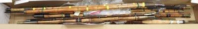 a box full of baseball bats sitting on a table