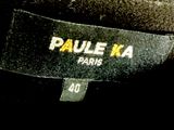 the label of a black jacket with the name paul ka on it