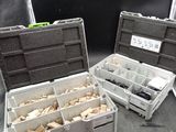 two plastic boxes with different types of tools in them