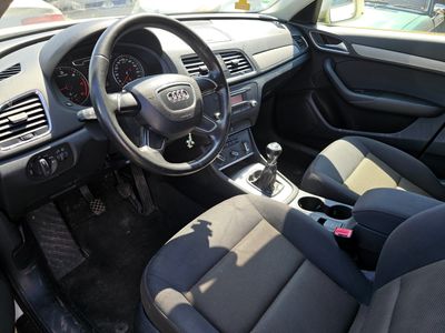 dashboard of a car with black leather seats and steering wheel
