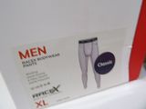 packaging of a pair of men ' s white underwear sitting on top of a white toilet