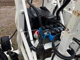 an image of a machine that is sitting in the dirt