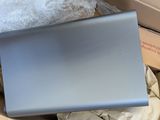 a laptop in a box that is sitting on a table
