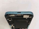 the back of a cell phone with a broken battery cover