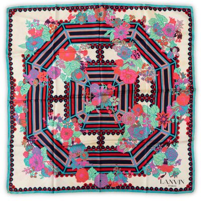 a multicolored floral print scarf with a black and red border