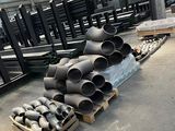many different types of pipes in a warehouse