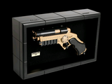 an image of a gun in a box on a black background