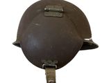 an old helmet with a metal buckle on a white background