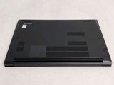 a black laptop that is sitting on a white surface