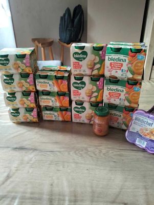 many boxes of yogurt and yogurts on the table