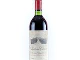red wine bottle with a red cap and a white background