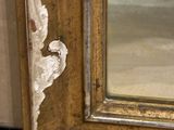 a picture of a picture of a mirror in a room