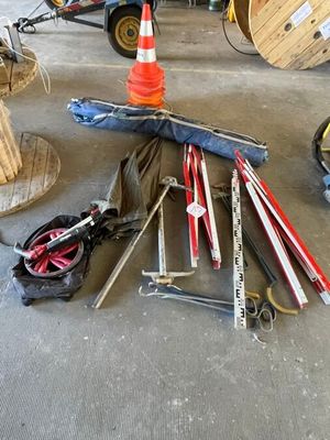 many different types of tools that are sitting on the floor