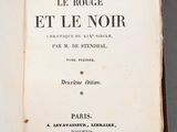an open book with a picture of the title of a novel