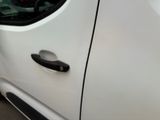 a close up of a car door handle on the side of the car