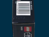 a black box with a red and white label on it
