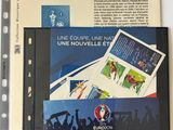 a lot of stamps on the cover of a book