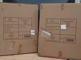 two boxes that are sitting next to each other on a table